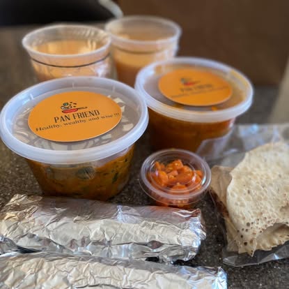 Pan Friend tiffin packaging with sabzi, dal, rice, roti and pickle