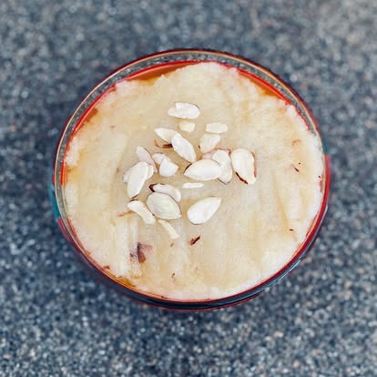 Sooji halwa topped with sliced almonds